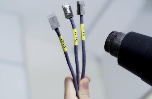 用熱風槍或風筒加熱標簽 用熱風槍或風筒加熱標簽